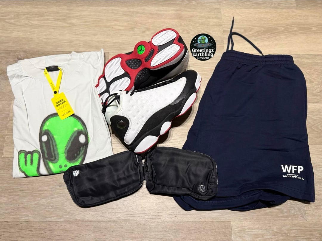 Bargain haul with Jordan 13 sneakers, alien graphic T-shirt, blue shorts and waist bags — photo 5