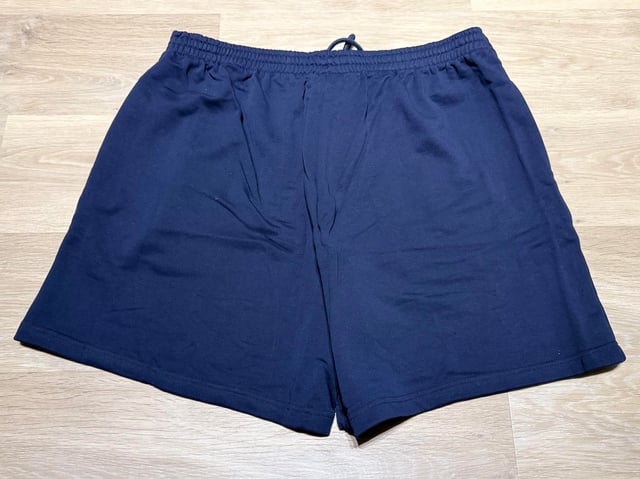 Bargain haul with Jordan 13 sneakers, alien graphic T-shirt, blue shorts and waist bags — photo 16